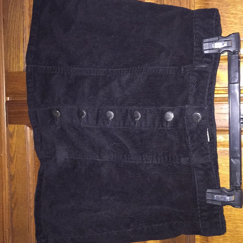 Black button down skirt.